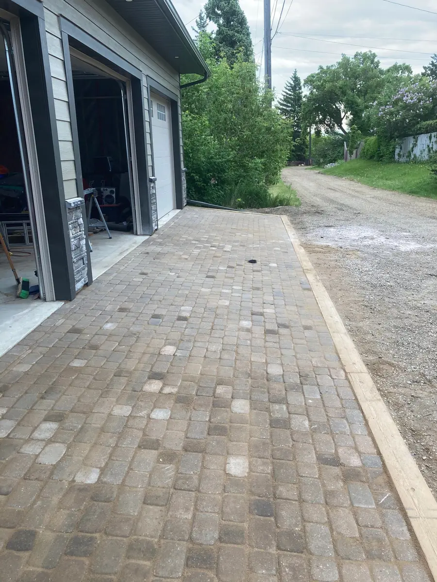 Lawn mowing service at a Morinville residential property