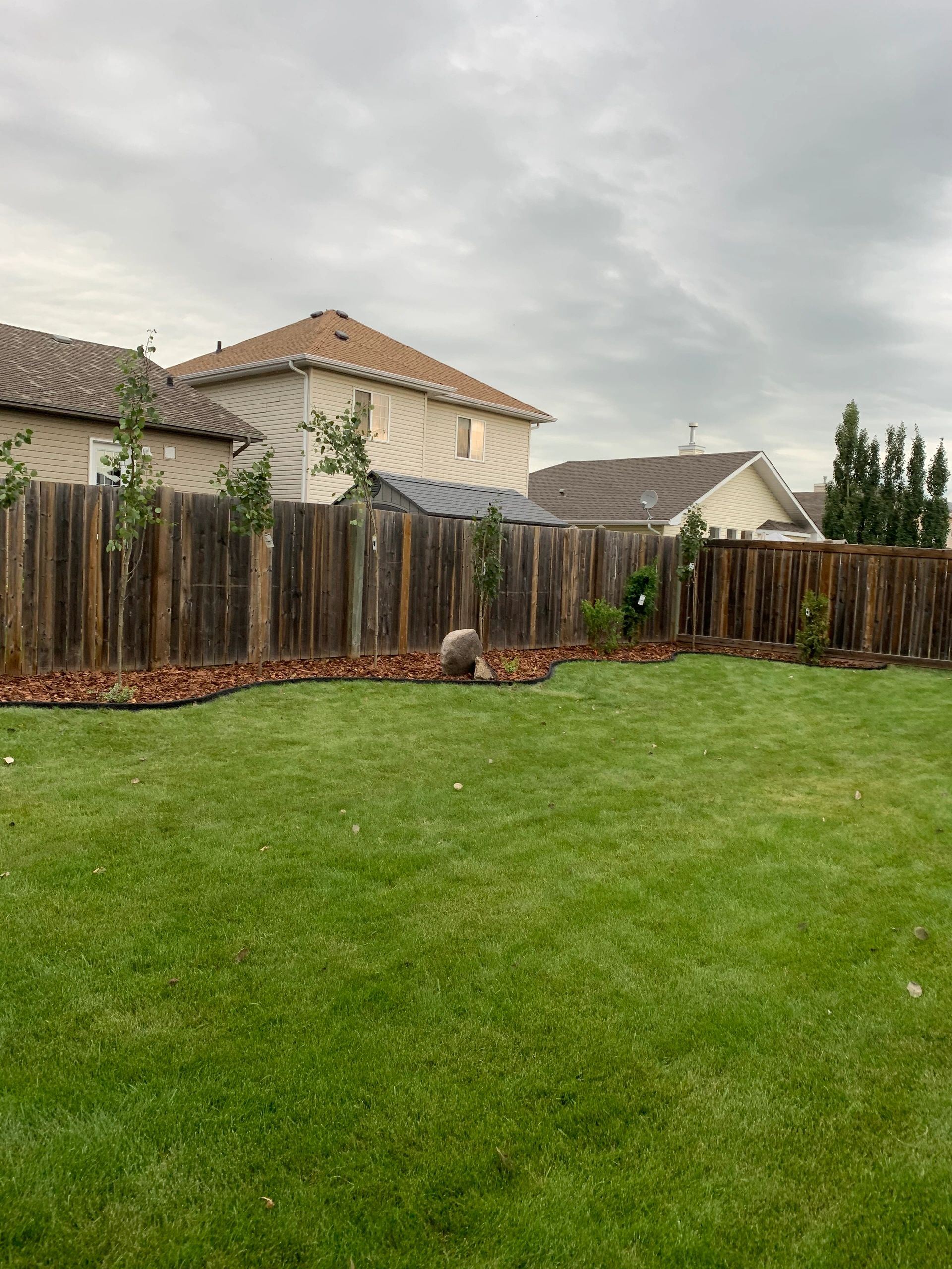 Fall leaf removal and cleanup at a Sturgeon County property
